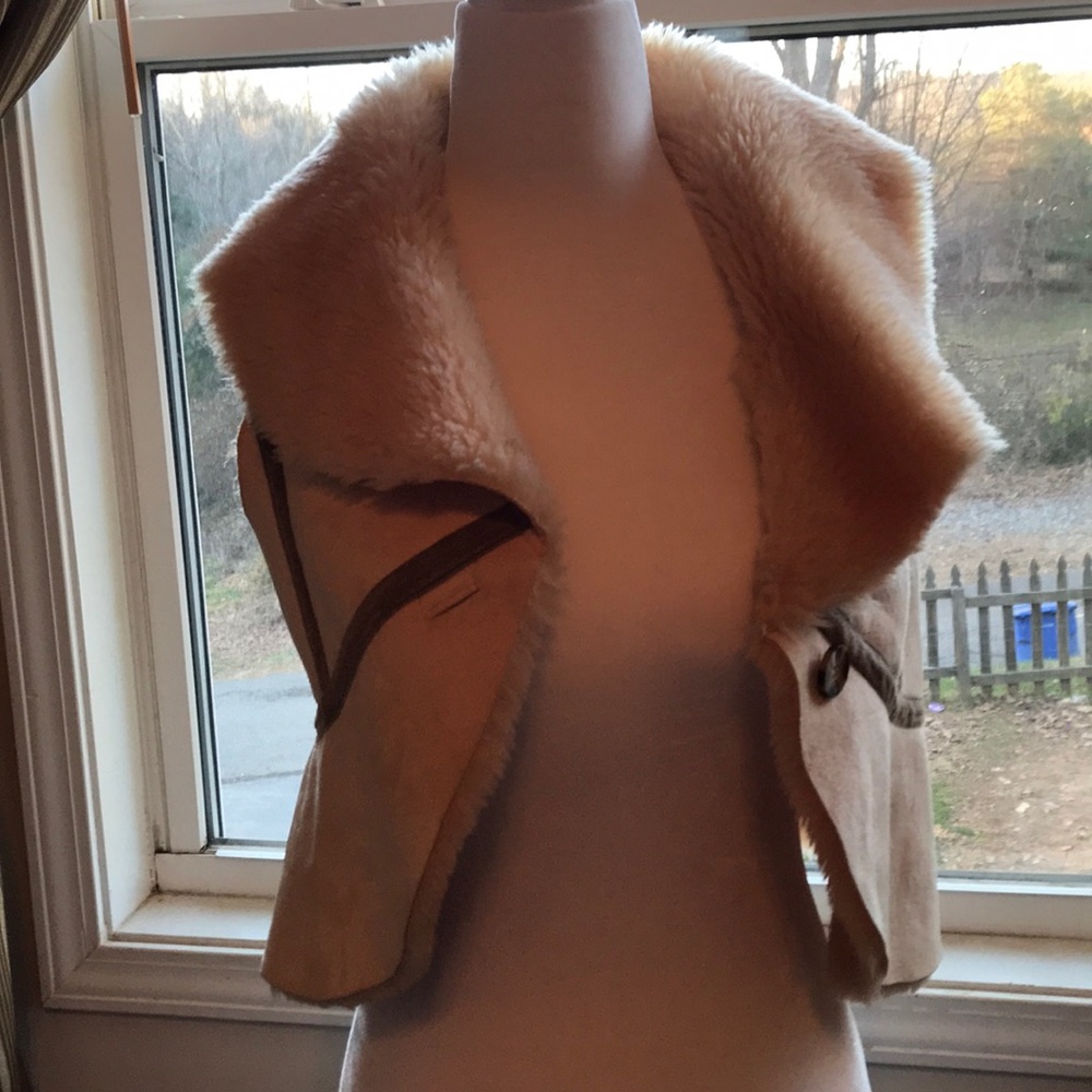 Fur and leather vest